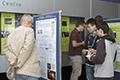 workshop attendees walking around and looking at the posters